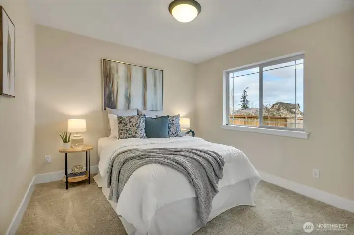 Main-floor bedroom with generous closet.  Next door to 3/4 bath.  NEW carpeting & paint!