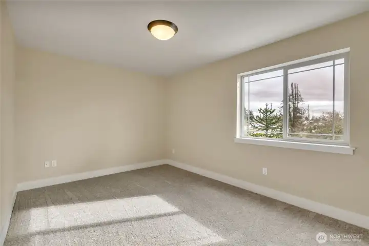 Side bedroom.  NEW carpet & Fresh Paint!