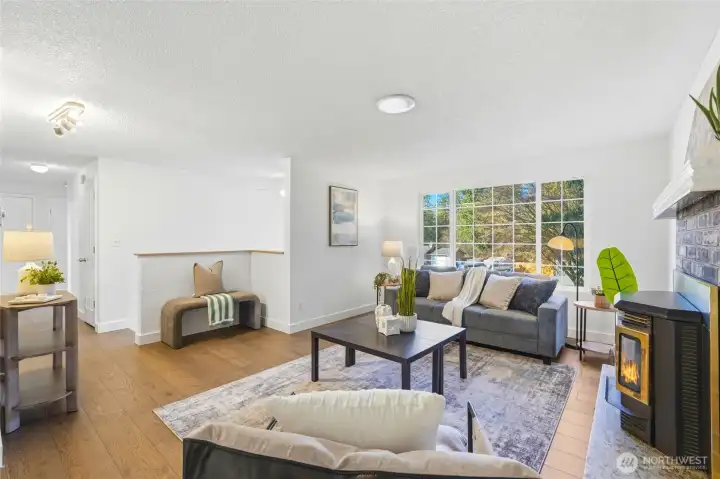 Open floor plan joins the living, dining and kitchen together.