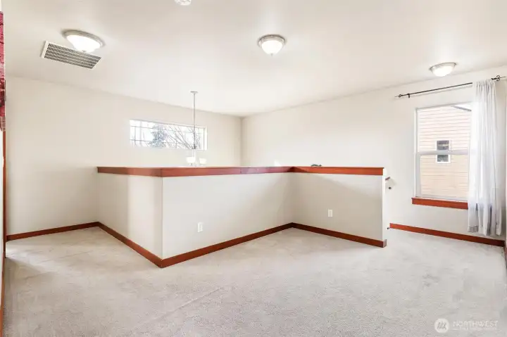 Loft space for cozy reading nook from hallway