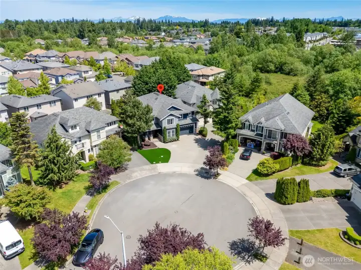 Cul-de-sac location near grass playfield.