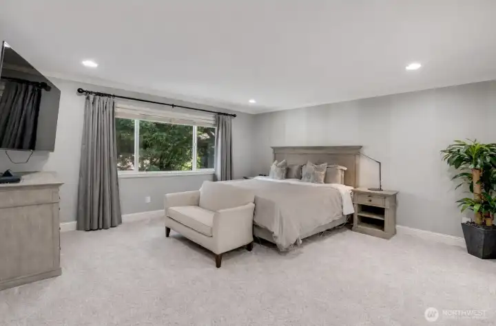 Primary bedroom with an amazing walk-in closet and en suite.