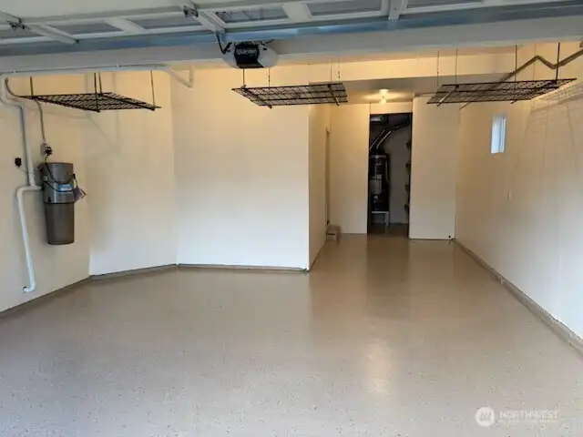 Brand new epoxy floor in finished garage.