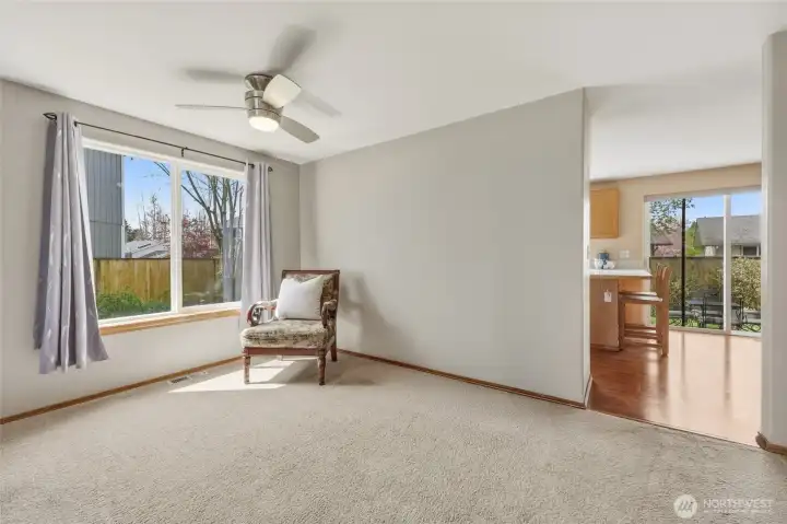 This was designed as a dining room area, though it can be considered an expansion of the front living room if desired.