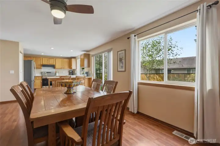 This room offers plenty of space should you choose to bring in couches and chairs, providing lots of options. Ceiling fan and light on remote.