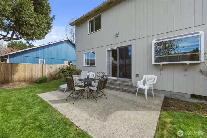 Enjoy al fresco dining or simply relax on the aggregate patio.