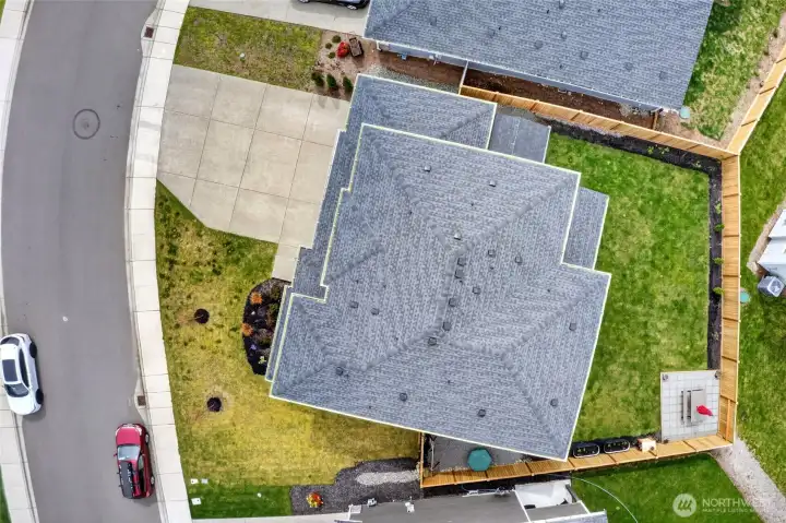 Aerial view of this 2534 square foot home offering 4 bedrooms, 2.5 baths, bonus room,  office and a 3 car garage with built in storage.  Sprinkler system installed in both front and back yards