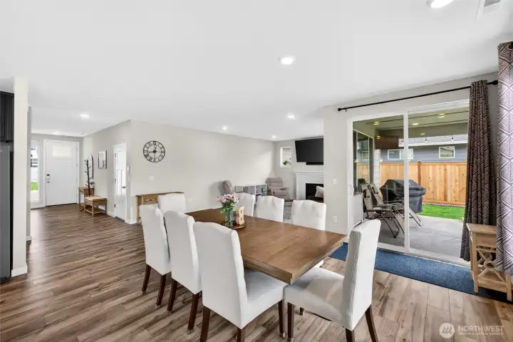 Step outside to extend your entertaining space with a covered patio, complete with storage-ready patio table