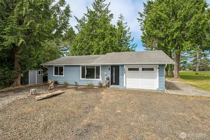 Low maintenance front yard with plenty of parking space