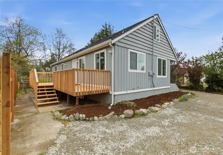 Newly installed deck, exterior paint, and roof