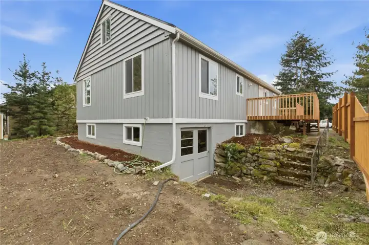 Separate entrance to an unfinished basement, approximately 1,176 sq. ft