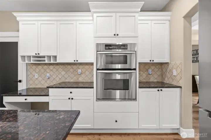 SS Double Oven with dark granite to update the look.