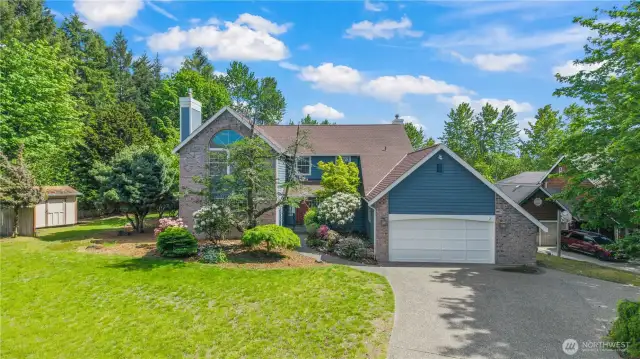 Fresh exterior paint along with freshened up landscaping makes this a much see!