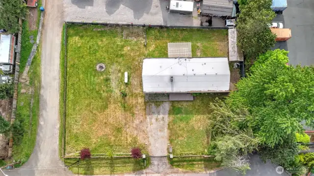 Aerial view showcasing the tons of space this almost half acre lot has to offer.