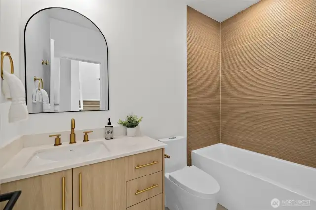Convenient main level full bath! Model home. Colors and finishes may vary.