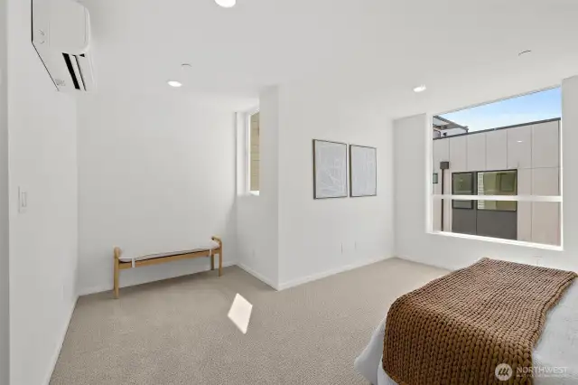 Primary suite with sitting area! Model home. Colors and finishes may vary.