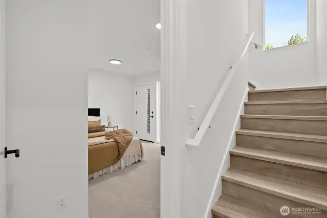 Lower level entry. Model home. Colors and finishes may vary.