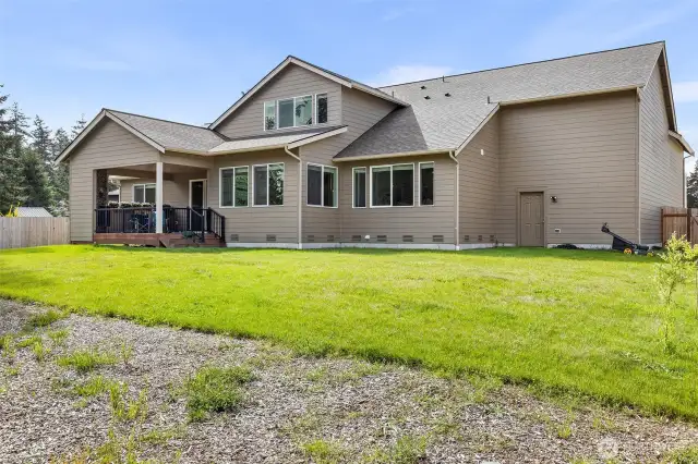 fenced and landscaped backyard