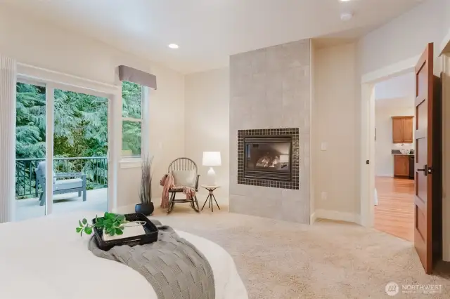 Enjoy another fireplace in your primary bedroom