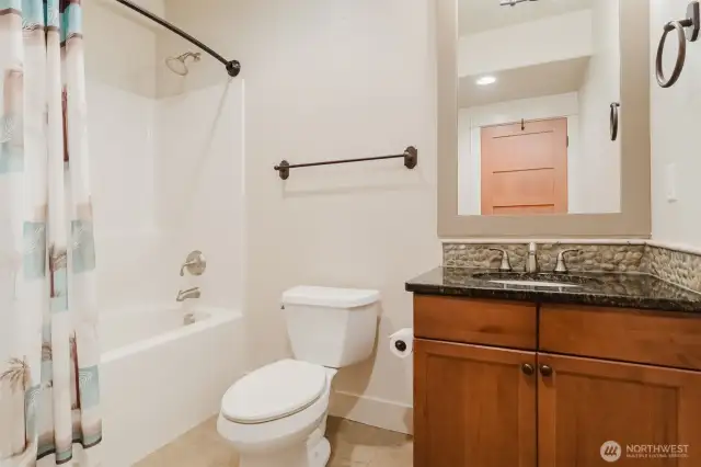 Beautiful rock backsplash detail around the sink