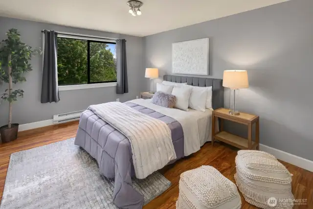 Primary bedroom with garden view!