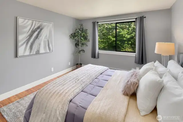 Primary bedroom with garden view!