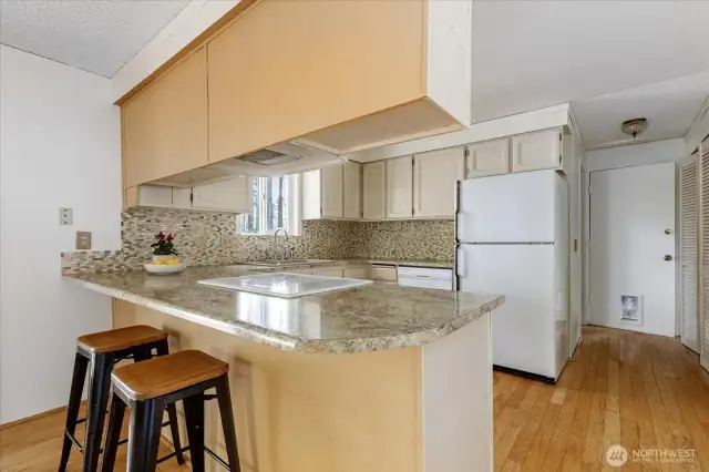 Kitchen peninsula perfect for counter height stools.