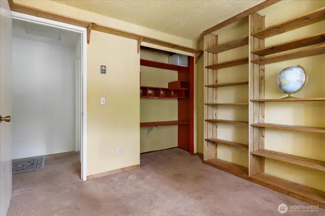 2nd Upstairs bedroom closet was converted to house a desk.