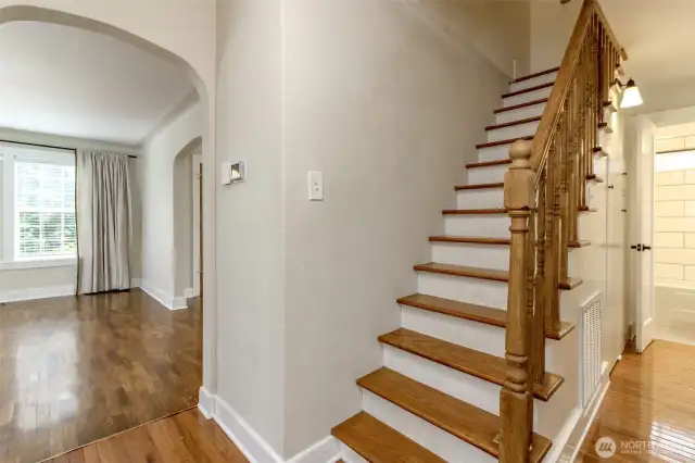 Stairs are tastefully located in the center of the home.
