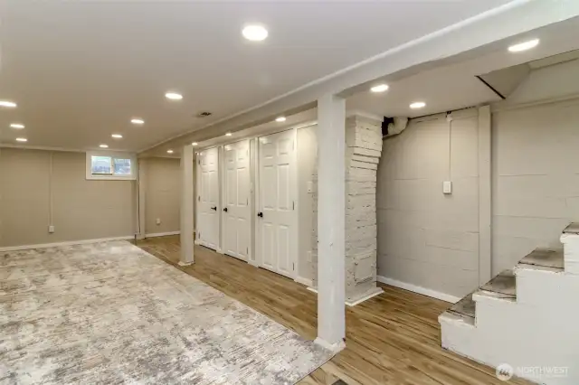Nice doors to conceal hot water tank and furnace and add extra storage.