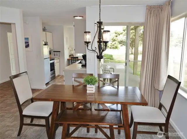 Dining Area w/ a slider to the rear patio.
