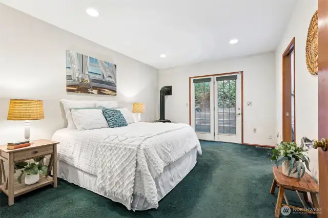 Primary Bedroom with woodstove, 3/4 ensuite and walk-in closet