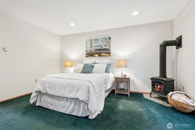 Primary Bedroom with woodstove, 3/4 ensuite and walk-in closet
