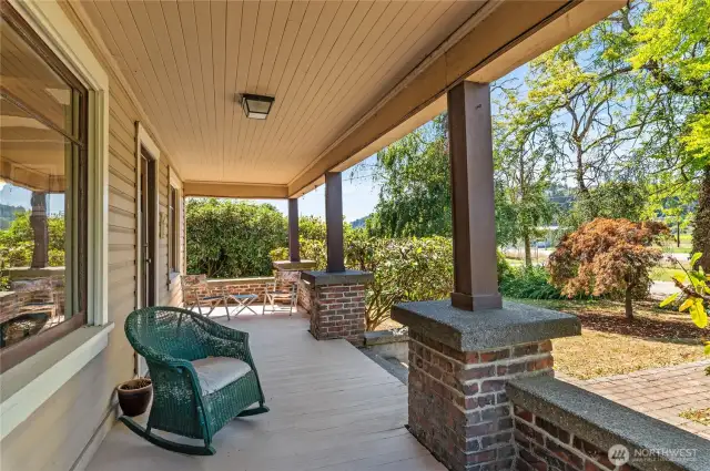 Large covered porch to relax and read a book.