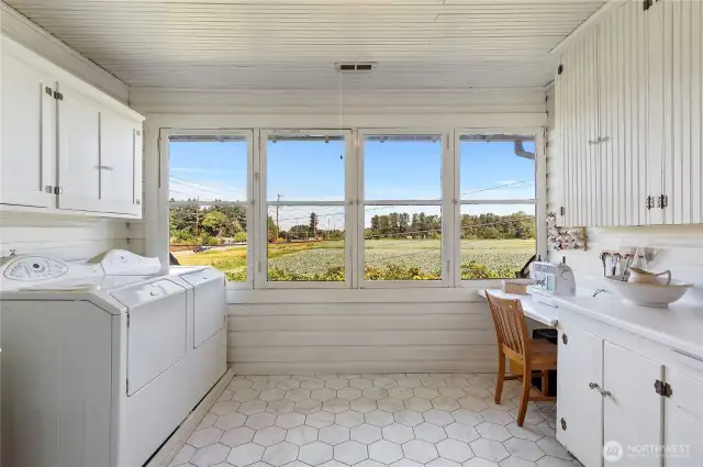 Amazing picturesque laundry/sewing room with views of the valley farming.