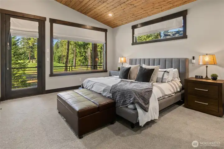 Primary suite with serene golf course views.