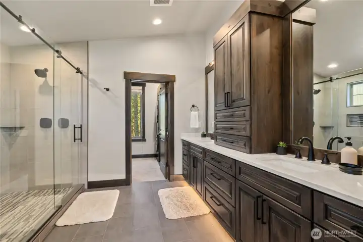 Primary bath boasts a large step-in shower.