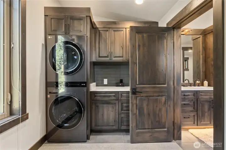 Private laundry room off the primary bath.