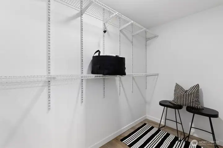 walk-in closet in primary bedroom