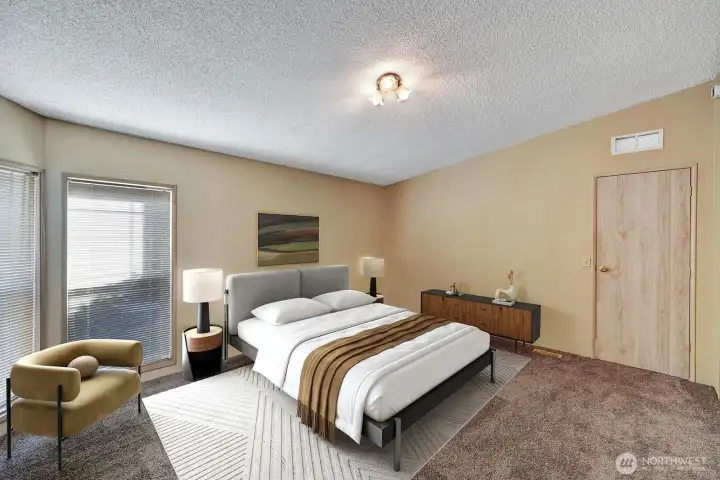 Primary Ensuite is very private and located at the north end of the home. Spacious room will accept a king size bed and more additional furniture. Virtually staged.