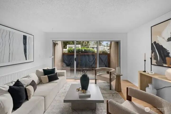 Light and bright, the spacious living room offers an open, airy feel with plenty of room to relax and entertain.