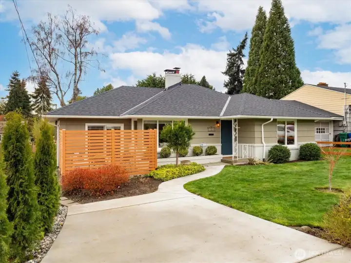 Seller also poured a new driveway in 2025 - it flows beautifully to the front door. Behind the privacy fence is a fun patio off the 2nd living room.