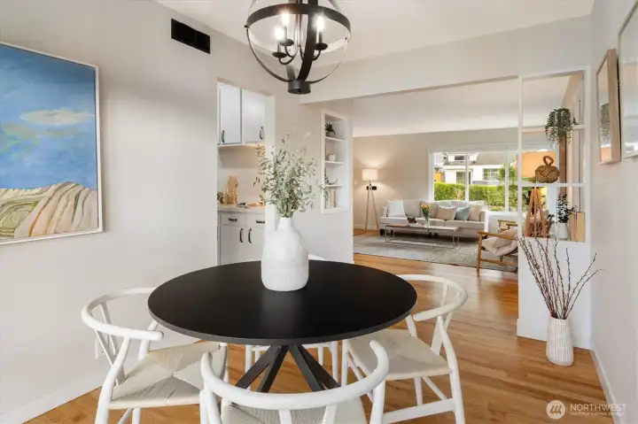 Looking back to the living room and additional built-ins with easy entry to the kitchen.