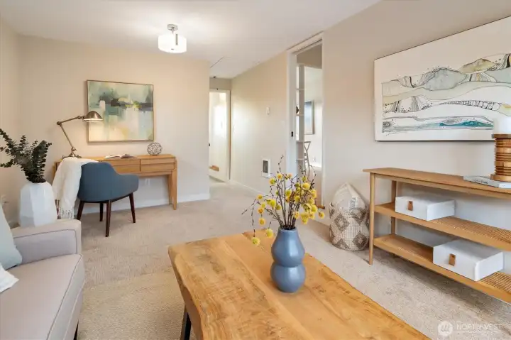 This 2nd living room is just off from the dining and main living room. So many uses - office, living space, short-term bedroom... Down the hallway is the 2nd (3/4) bathroom.