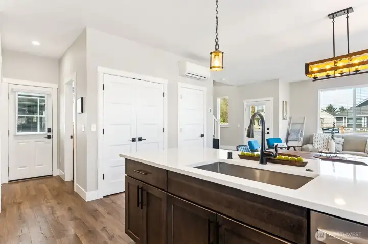 Extra storage in pantry closet and understairs closet