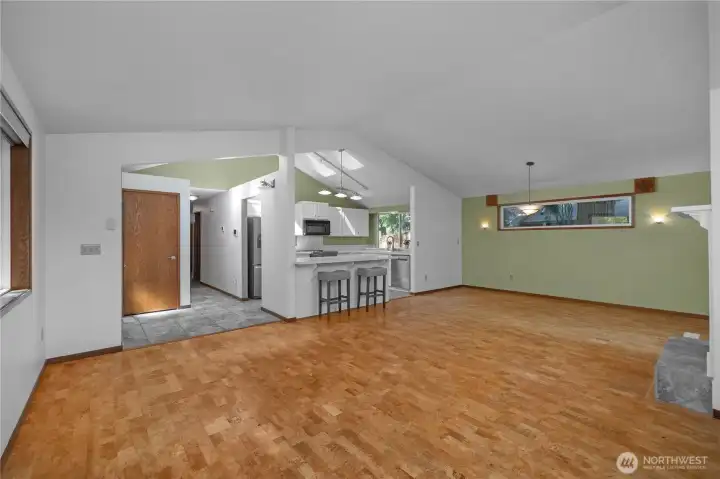 Seamless flow from living area to kitchen creates a bright, connected gathering space.