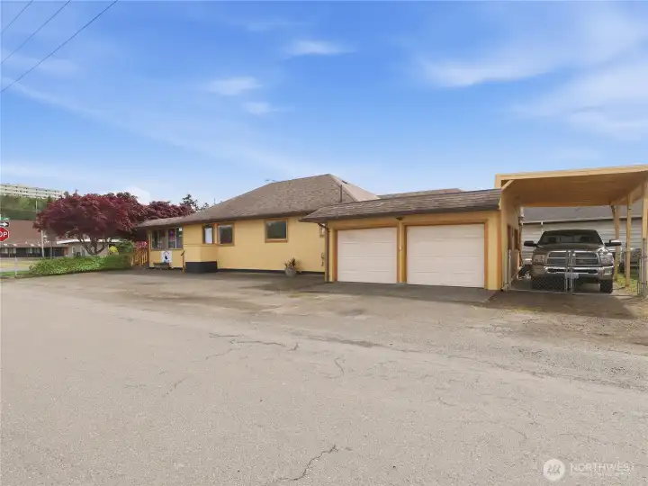 Double Car Garage & Covered RV Carport Parking.
