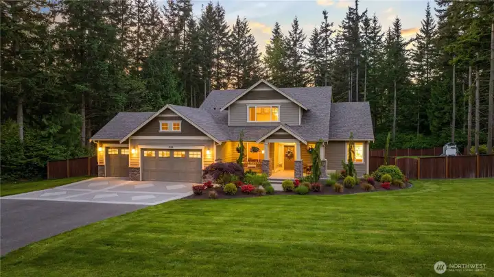 Welcome to this 1+ acre private retreat in gated Eaglecrest community!