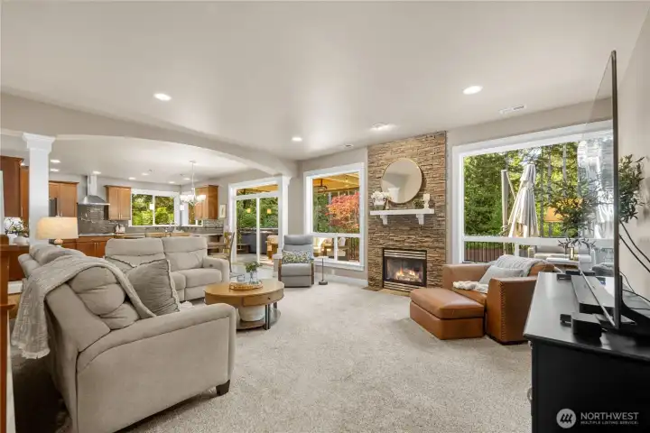 Open living room w/inviting atmosphere, gas/propane fireplace, views of yard & greenbelt!