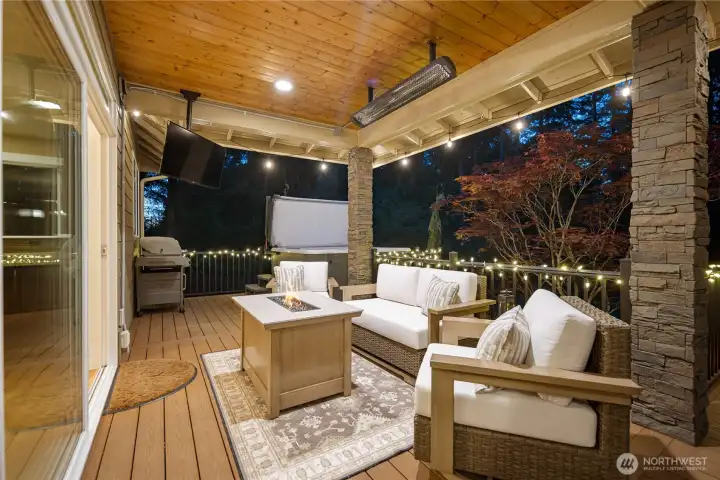 Mounted TV, heater, gas hookups for BBQ & newer hot tub that conveys! Deck was specially built to hold hot tub.
